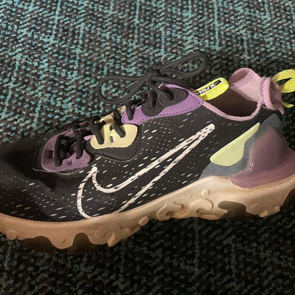 Men’s /women’s like new Nike running shoes men’s size 9.5 women’s 11.